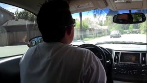 Peek in on Talia Palmer through a glory hole before a cock gets shoved through it