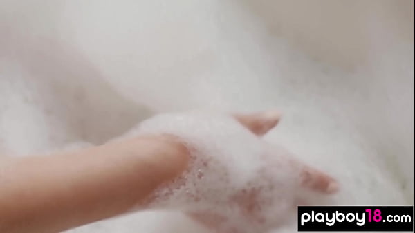 Petite Belarusian teen blondie Lilly A reveals her bubble covered pussy