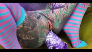 Two inked lesbians stretch each other’s asses with huge toys — gaping holes, ATM action, and real orgasms