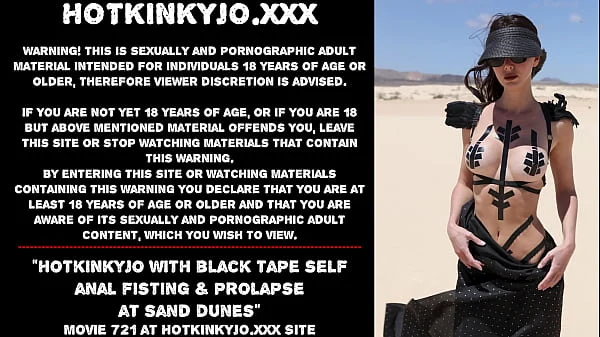 Hotkinkyjo with black tape self anal fisting & prolapse at sand dunes