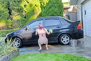 Sexy T4t Trans Woman Washes Her Filthy Car For The Hungering Maw Of Capitalism With A Big Glass Plug