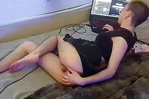 Boy In A Skirt Playing While On Pc