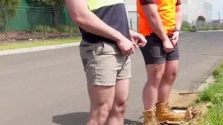 Two Tradies Taking a Slash