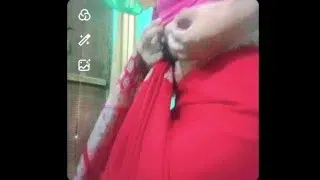 Indian gay Crossdresser xxx nude in red saree showing his bra and boobs🥵