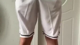 Wearing a sky blue basketball uniform and masturbating