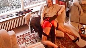 Caned in a Tight Red Leather Skirt