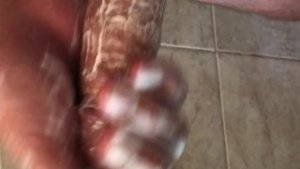 Soapy cock stroking in the shower