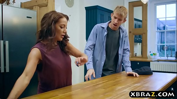 Busty mother-in-law seduces the husband in the kitchen